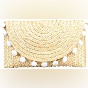 Rattan beachy clutch with white Pom poms and gold chain